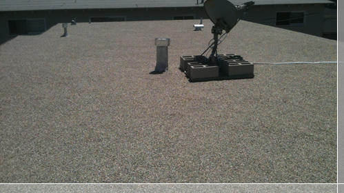 Rock roof with satellite dish installation on roof - El Segundo